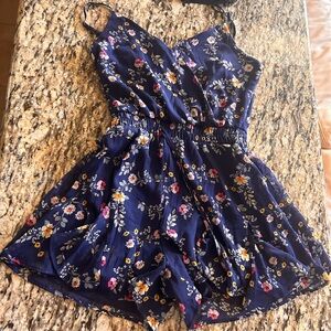 Dark blue with flowers romper size small